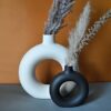 The Vintage Artefacts Ceramic Donut Vase Small Size Round Shape for Indoor Table and Home Decor (Black Big and White Small Matt, Standard) Set of Two White Big and Black Small. (8.5 and 5 inches)